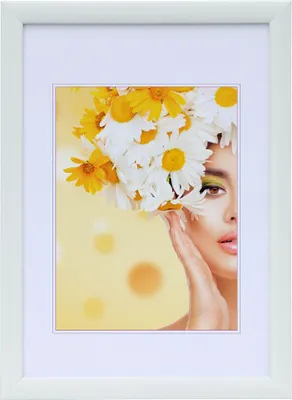 A woman wearing a crown of daisies and yellow flowers, with a yellow background.