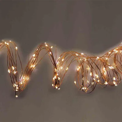 Image de Chaîne LED en fil de cuivre avec minuterie 20er blanc chaud à l'intérieur, pour 3 x AA