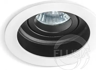 A close-up shot of a white recessed ceiling light fixture with a black interior.