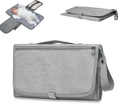 Produktbild von Baby-Organizer-Set mit grauem Aankleedkissen und Schrank für Babyzimmer
