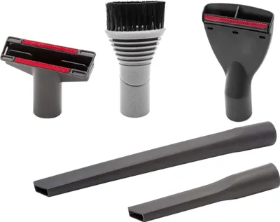 A collection of vacuum cleaner attachments, including a crevice tool, a brush tool, and a wide nozzle, arranged against a white background.