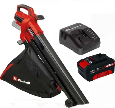 A red and black Einhell leaf blower with a collection bag, a battery, and a charger are displayed against a white background.