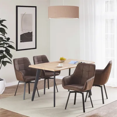 A dining room scene with a table and chairs.