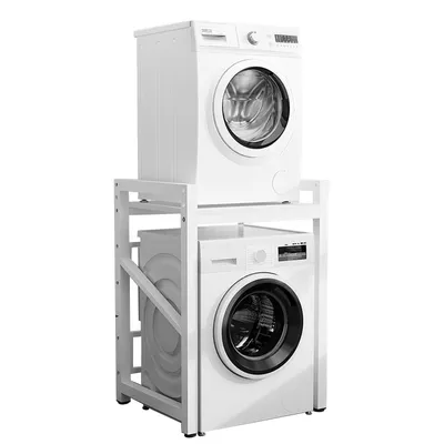 A white washing machine and dryer unit stacked on top of each other.
