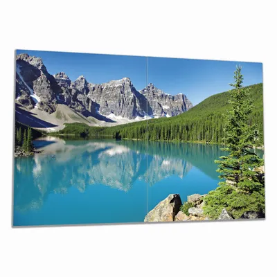 Produktbild von Wallario Herdabdeckplatte aus Glas, Größe 80 x 52 cm 2-teilig, Motiv Tiefblauer See mit Bergpanorama und Wäldern  Kanada