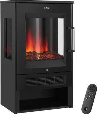 A black electric fireplace with a visible flame effect and a remote control.
