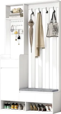 A white entryway organizer with hooks, a bench, and shoe storage.