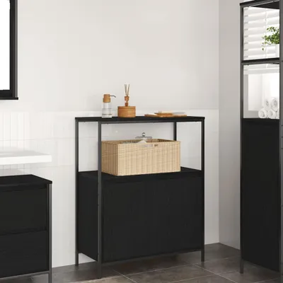 A modern bathroom with a black storage cabinet and shelving unit.