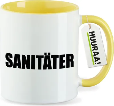 Produktbild von Huuraa Kaffeetasse Sanitäter Schriftzug 330ml Gelb Keramik Kaffeebecher Geschenkidee