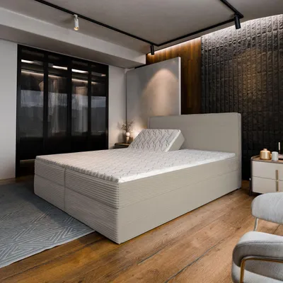 A bedroom scene featuring a large bed.