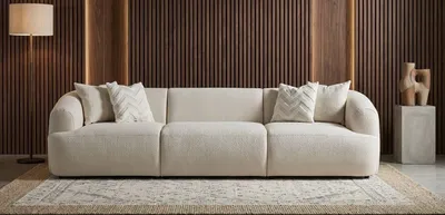 Image de Canapé 3 places, tissu beige, style moderne, confortable, idéal pour le salon
