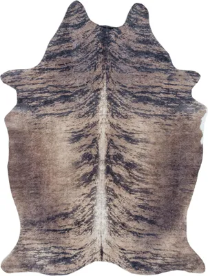 A cowhide rug with a brindle pattern.