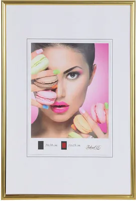 A framed photo of a woman holding macarons, with text indicating product details.
