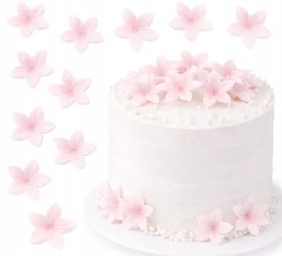 Produktbild von Blümchen aus Oblaten MINI 2 cm, rosa, 15 Stück – Dekoration für Torten und Cupcakes