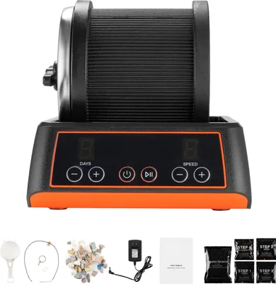 A product shot of a rock tumbler and its accessories on a white background.