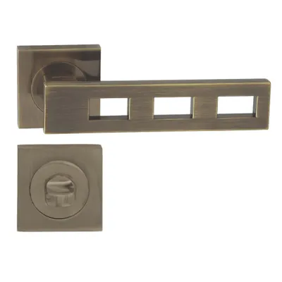 Produktbild von DOMINO Türgriff Drückergarnitur WC - Badezimmer Set | Vierkant-Rosette | Türbeschlag für Badezimmertüren | Set WC - Rosetten-Garnitur | Türklinke aus Aluminium | Bronze Türdrückergarnitur | TRE-QR M3