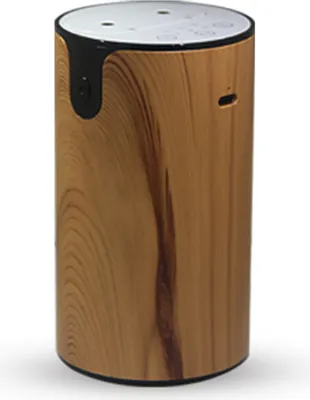 A cylindrical aromatherapy diffuser with a wood-grain finish and a white top.