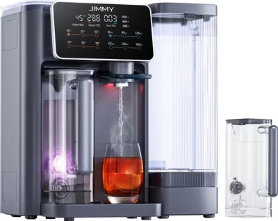A water dispenser with a built-in filter and a separate water tank, dispensing hot water into a glass.