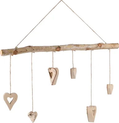 A hanging decoration made of a birch branch with seven wooden hearts suspended by twine.