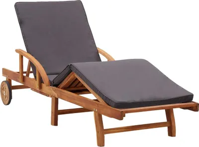A wooden sun lounger with a gray cushion, shown on a white background.