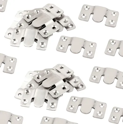 A collection of interlocking furniture connectors.