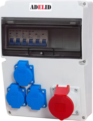 A white electrical distribution box with multiple outlets and circuit breakers visible through a clear cover.