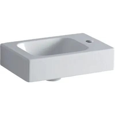A white ceramic sink is shown against a white background.