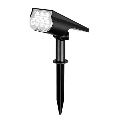 A black solar spotlight with multiple LED lights, mounted on a stake.