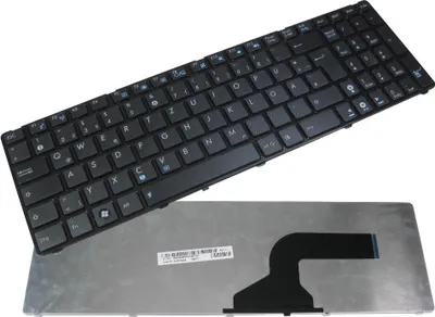 A laptop keyboard and its metallic base are shown against a white background.