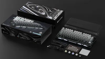 A gaming keyboard and its packaging are displayed on a black surface.