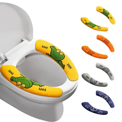 A toilet seat with colorful, patterned toilet seat covers featuring cartoon animals.
