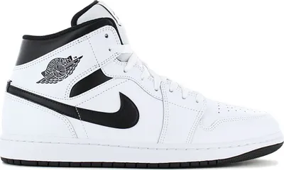 A studio shot of a white and black Nike Air Jordan 1 Mid sneaker.
