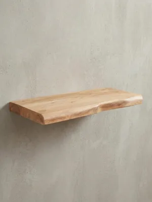 Seitenansicht des massiven Wandboards, das die Materialstärke von 4 cm und das klare Profil des Akazienholzes deutlich macht._#sku_BARWL6.512#