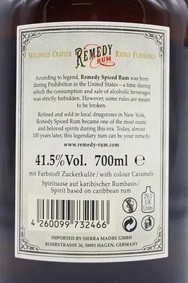 The image shows the back label of a bottle of Remedy Spiced Rum.