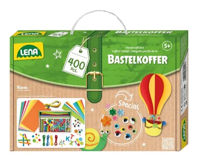 A cardboard box for a LENA handicraft kit, designed to look like a suitcase. It features colorful illustrations of craft supplies, a hot air balloon, and a snail.