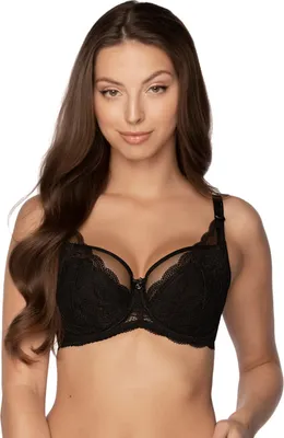 A woman wearing a black lace bra.