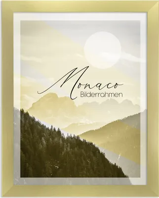 A framed picture of mountains with text overlay.