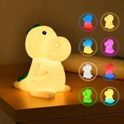 Immagine prodotto di Lampada LED per bambini, lampada a forma di dinosauro in silicone con 3 LED e 7 colori, comando touch/ricaricabile tramite USB, intensità regolabile, ideale per la cameretta dei bambini.
