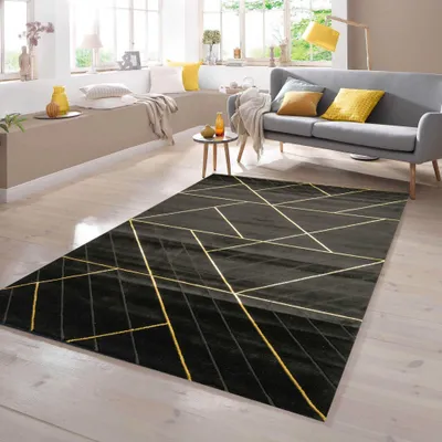 Produktbild von Teppich modern geometrisches Muster in schwarz gold Größe - 60 x 110 cm