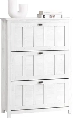 A white shoe cabinet with three flip-down doors.