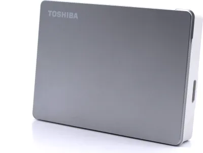 A Toshiba Canvio Flex external hard drive is shown against a white background.