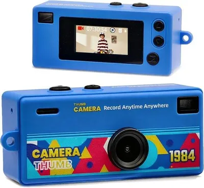 Image de Petit appareil photo numérique avec écran LCD de 0,96 pouce, 1080p, objectif grand angle à 130°, design rétro, format porte-clés, idéal comme cadeau d'anniversaire, fait partie d'une collection de 8 modèles différents (32 Go).