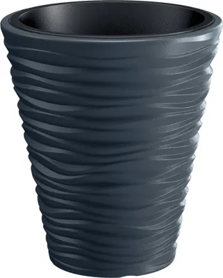 A dark gray planter with a textured, wavy design.