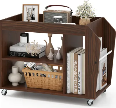A wooden rolling cart with books, vases, and decorative items on its shelves.