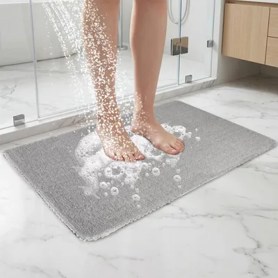 Zdjęcie produktu dla Antypoślizgowa mata pod prysznic 60x40 cm, szara, wykonana z PVC, z wkładką z luffy i otworem odpływowym
