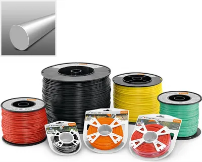 A collection of spools of trimmer line in various colors, along with a sample of the material.