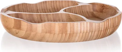 A round, segmented bamboo serving dish is shown from a side-angle against a white background.