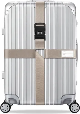 A silver suitcase with khaki straps and a combination lock.
