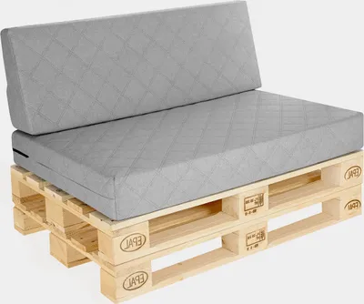 A gray pallet cushion set on wooden pallets.