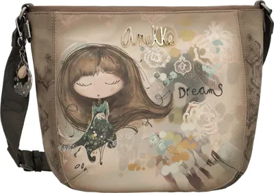 A close-up of a handbag with a whimsical illustration.
